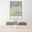 24x36 Ojai California Map Print Portrait Orientation in Woodblock Style Behind 2 Chairs Table and Potted Plant