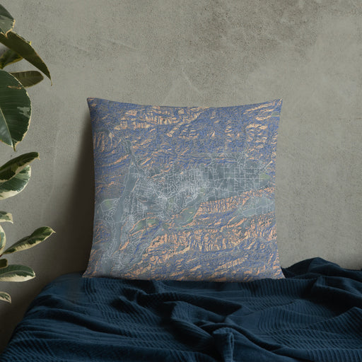 Custom Ojai California Map Throw Pillow in Afternoon on Bedding Against Wall