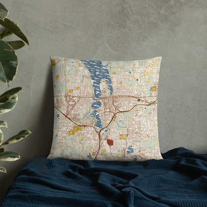 Custom Olympia Washington Map Throw Pillow in Woodblock on Bedding Against Wall