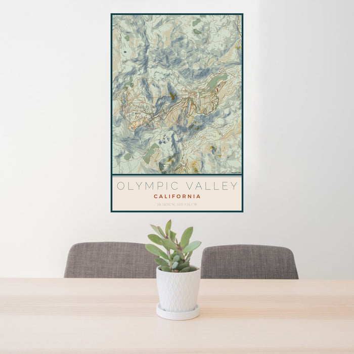 24x36 Olympic Valley California Map Print Portrait Orientation in Woodblock Style Behind 2 Chairs Table and Potted Plant