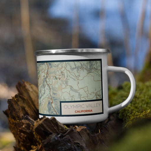 Right View Custom Olympic Valley California Map Enamel Mug in Woodblock on Grass With Trees in Background