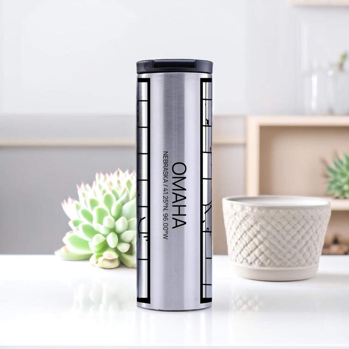 Omaha Nebraska Custom City Map Inscription Coordinates on 17oz Stainless Steel Insulated Tumbler in Tactile Lines with Succulent in Background