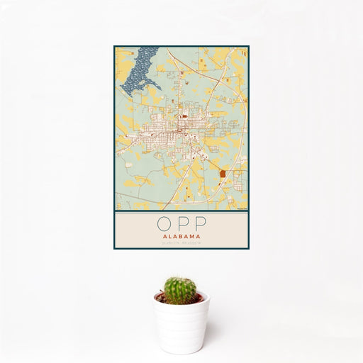 12x18 Opp Alabama Map Print Portrait Orientation in Woodblock Style With Small Cactus Plant in White Planter