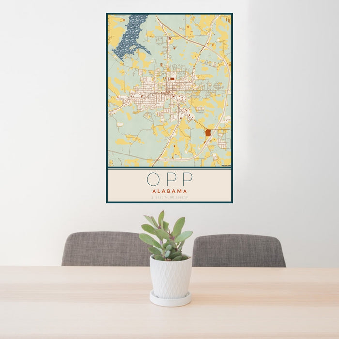 24x36 Opp Alabama Map Print Portrait Orientation in Woodblock Style Behind 2 Chairs Table and Potted Plant