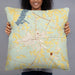 Person holding 22x22 Custom Opp Alabama Map Throw Pillow in Woodblock