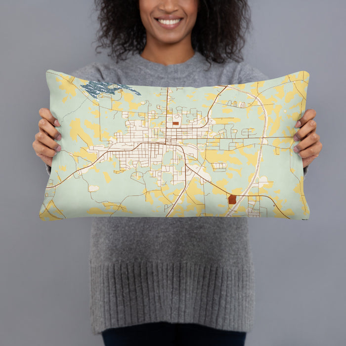 Person holding 20x12 Custom Opp Alabama Map Throw Pillow in Woodblock