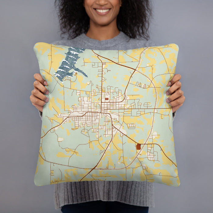Person holding 18x18 Custom Opp Alabama Map Throw Pillow in Woodblock