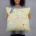 Person holding 18x18 Custom Opp Alabama Map Throw Pillow in Woodblock