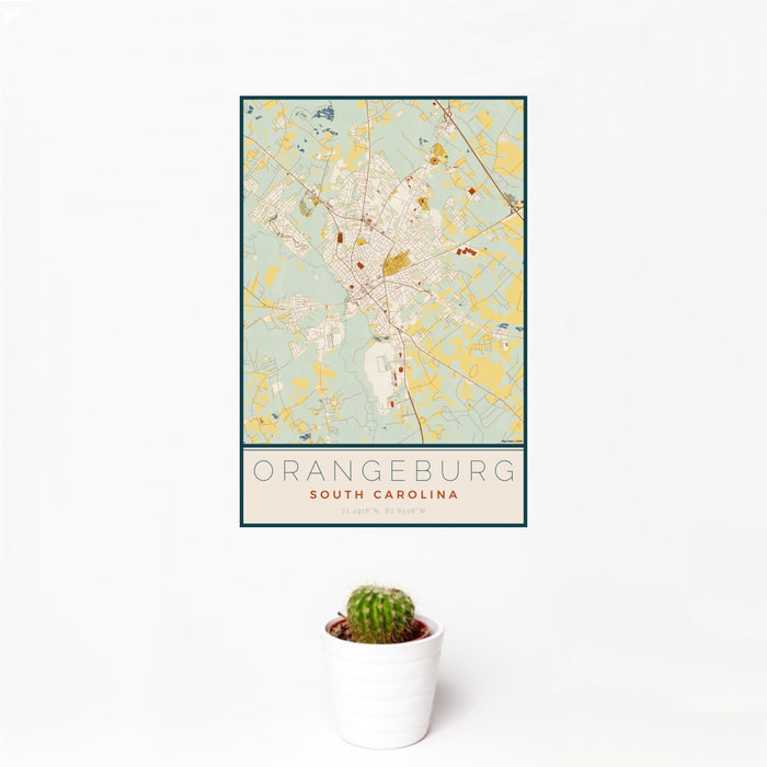 12x18 Orangeburg South Carolina Map Print Portrait Orientation in Woodblock Style With Small Cactus Plant in White Planter