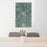 24x36 Ord Nebraska Map Print Portrait Orientation in Afternoon Style Behind 2 Chairs Table and Potted Plant