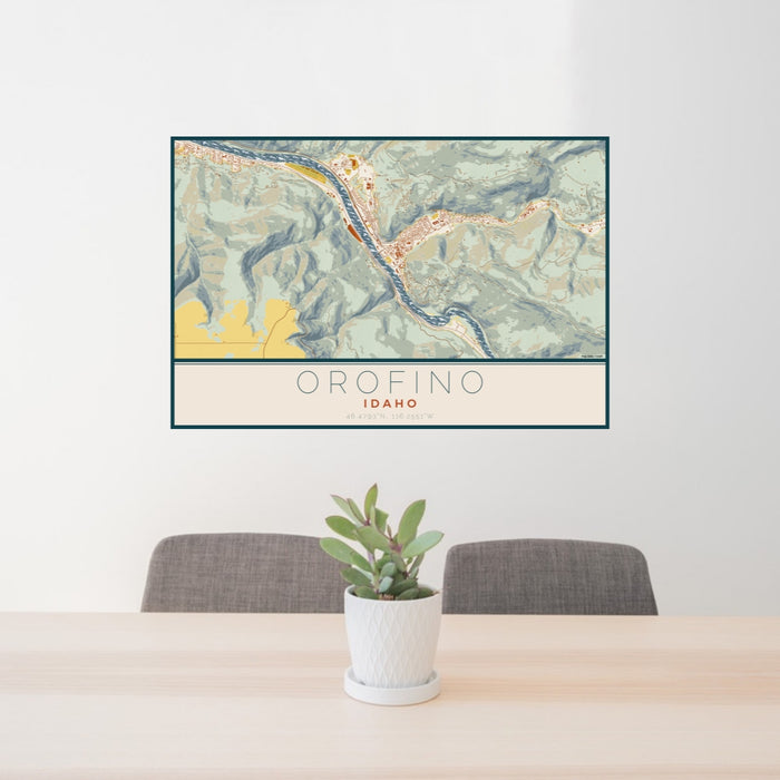 24x36 Orofino Idaho Map Print Lanscape Orientation in Woodblock Style Behind 2 Chairs Table and Potted Plant