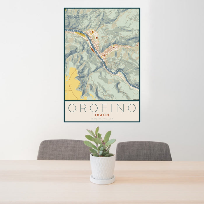 24x36 Orofino Idaho Map Print Portrait Orientation in Woodblock Style Behind 2 Chairs Table and Potted Plant
