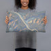 Person holding 20x12 Custom Orofino Idaho Map Throw Pillow in Afternoon