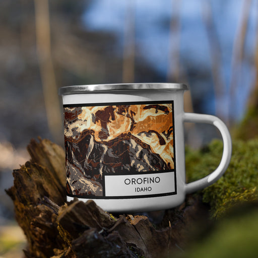 Right View Custom Orofino Idaho Map Enamel Mug in Ember on Grass With Trees in Background