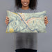 Person holding 20x12 Custom Orofino Idaho Map Throw Pillow in Woodblock