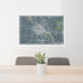 24x36 Ottumwa Iowa Map Print Lanscape Orientation in Afternoon Style Behind 2 Chairs Table and Potted Plant