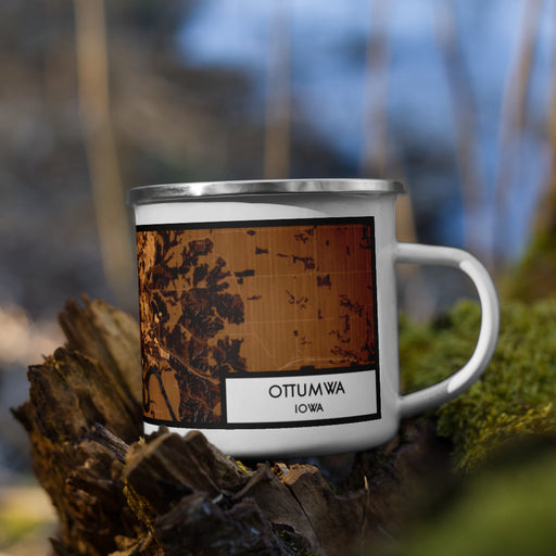Right View Custom Ottumwa Iowa Map Enamel Mug in Ember on Grass With Trees in Background