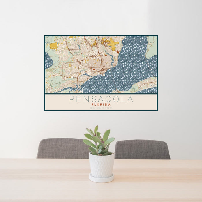24x36 Pensacola Florida Map Print Lanscape Orientation in Woodblock Style Behind 2 Chairs Table and Potted Plant