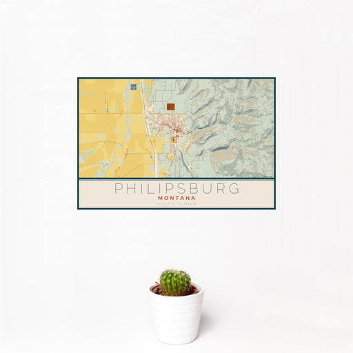 12x18 Philipsburg Montana Map Print Landscape Orientation in Woodblock Style With Small Cactus Plant in White Planter