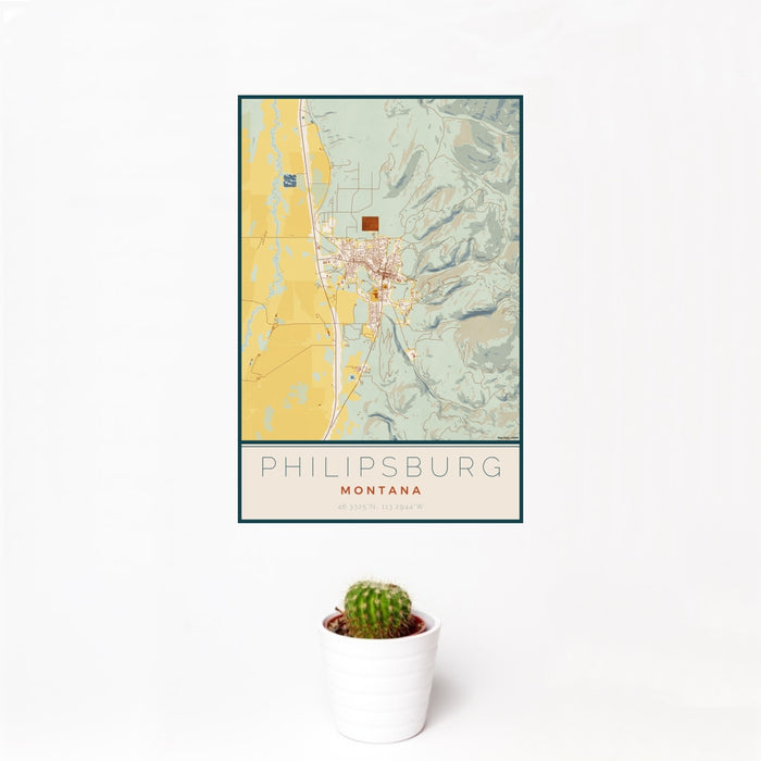 12x18 Philipsburg Montana Map Print Portrait Orientation in Woodblock Style With Small Cactus Plant in White Planter