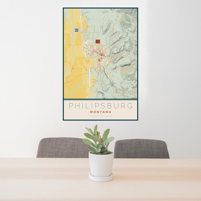 24x36 Philipsburg Montana Map Print Portrait Orientation in Woodblock Style Behind 2 Chairs Table and Potted Plant