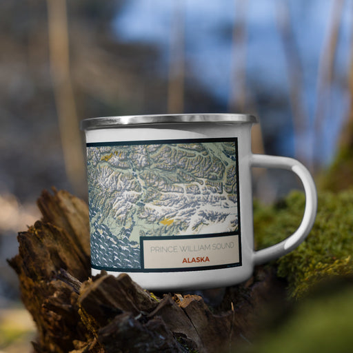 Right View Custom Prince William Sound Alaska Map Enamel Mug in Woodblock on Grass With Trees in Background