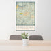 24x36 Ramona California Map Print Portrait Orientation in Woodblock Style Behind 2 Chairs Table and Potted Plant