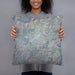 Person holding 18x18 Custom Ramona California Map Throw Pillow in Afternoon