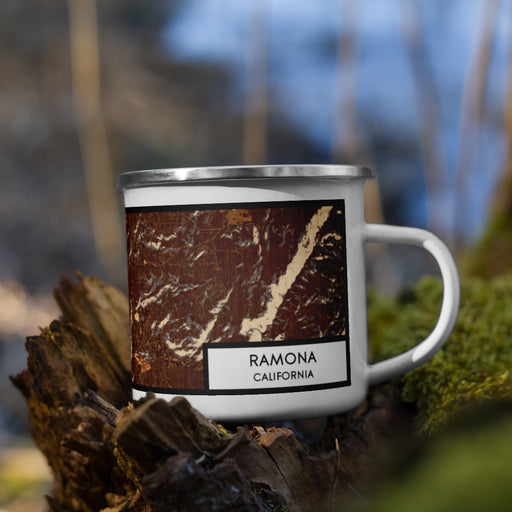 Right View Custom Ramona California Map Enamel Mug in Ember on Grass With Trees in Background