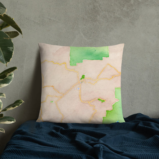 Custom Ramona California Map Throw Pillow in Watercolor on Bedding Against Wall