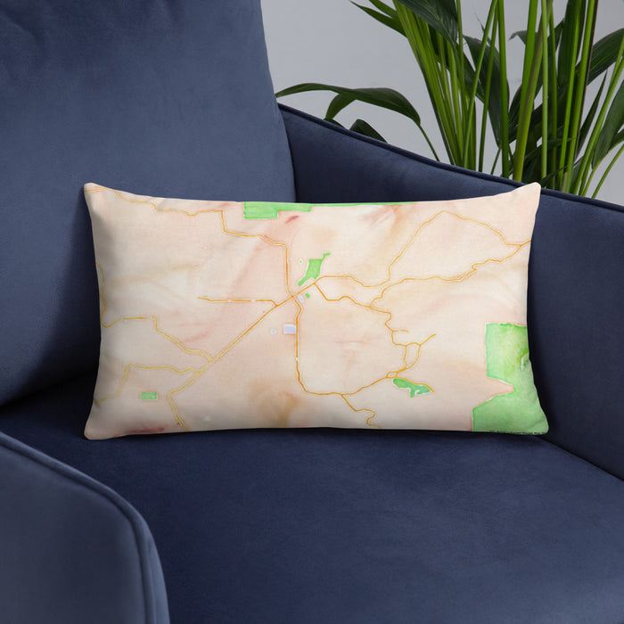 Custom Ramona California Map Throw Pillow in Watercolor on Blue Colored Chair
