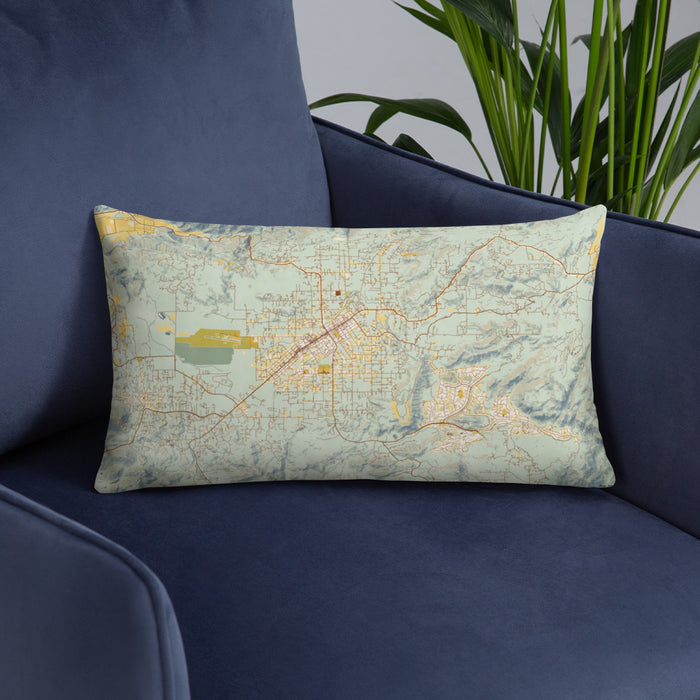 Custom Ramona California Map Throw Pillow in Woodblock on Blue Colored Chair