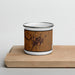 Front View Custom Rexburg Idaho Map Enamel Mug in Ember on Cutting Board