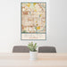 24x36 Rialto California Map Print Portrait Orientation in Woodblock Style Behind 2 Chairs Table and Potted Plant