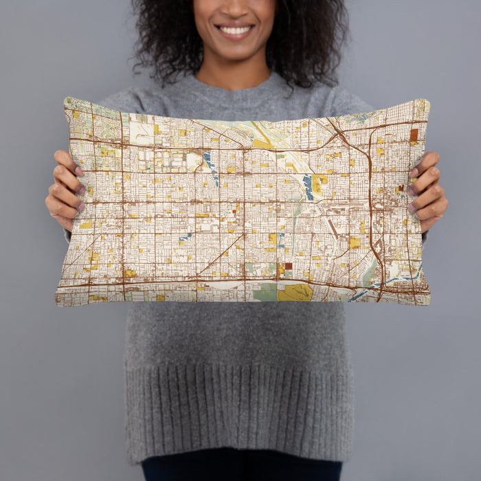 Person holding 20x12 Custom Rialto California Map Throw Pillow in Woodblock