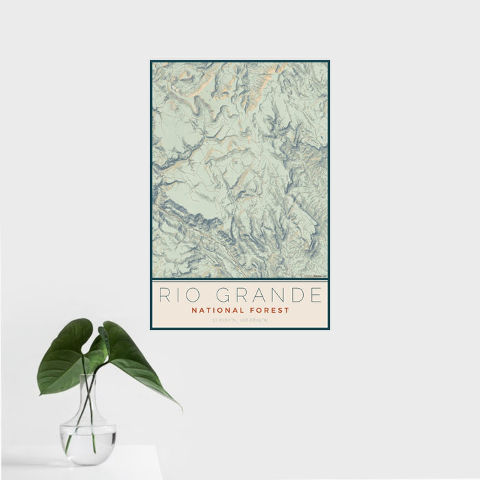 16x24 Rio Grande National Forest Map Print Portrait Orientation in Woodblock Style With Tropical Plant Leaves in Water