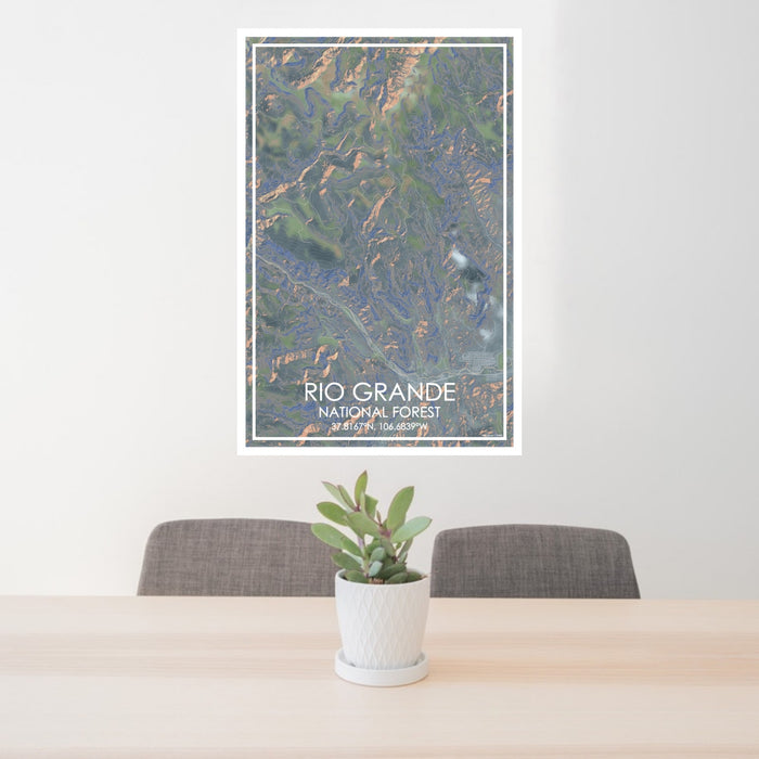 24x36 Rio Grande National Forest Map Print Portrait Orientation in Afternoon Style Behind 2 Chairs Table and Potted Plant