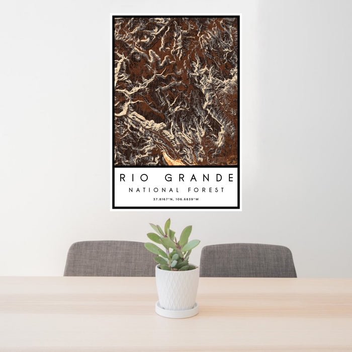 24x36 Rio Grande National Forest Map Print Portrait Orientation in Ember Style Behind 2 Chairs Table and Potted Plant