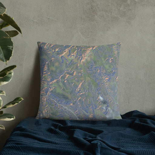 Custom Rio Grande National Forest Map Throw Pillow in Afternoon on Bedding Against Wall