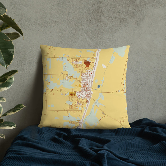 Custom Roanoke Indiana Map Throw Pillow in Woodblock on Bedding Against Wall