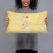 Person holding 20x12 Custom Roanoke Indiana Map Throw Pillow in Woodblock