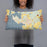 Person holding 20x12 Custom Rock Hall Maryland Map Throw Pillow in Woodblock