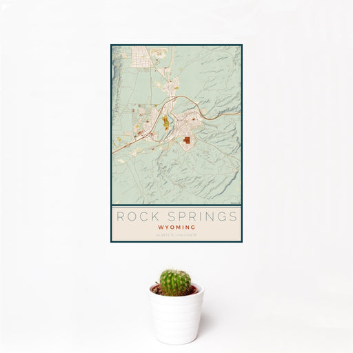 12x18 Rock Springs Wyoming Map Print Portrait Orientation in Woodblock Style With Small Cactus Plant in White Planter