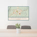 24x36 Rock Springs Wyoming Map Print Lanscape Orientation in Woodblock Style Behind 2 Chairs Table and Potted Plant