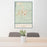 24x36 Rock Springs Wyoming Map Print Portrait Orientation in Woodblock Style Behind 2 Chairs Table and Potted Plant