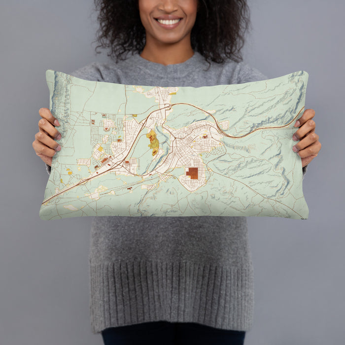 Person holding 20x12 Custom Rock Springs Wyoming Map Throw Pillow in Woodblock