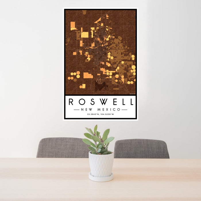24x36 Roswell New Mexico Map Print Portrait Orientation in Ember Style Behind 2 Chairs Table and Potted Plant