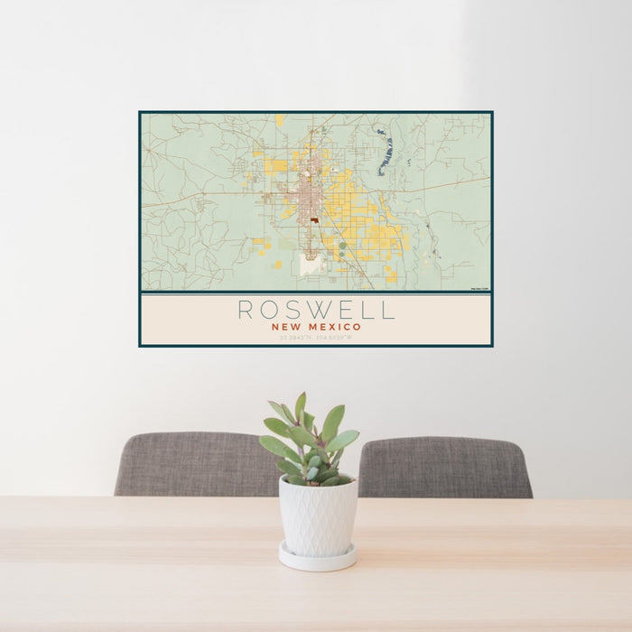24x36 Roswell New Mexico Map Print Lanscape Orientation in Woodblock Style Behind 2 Chairs Table and Potted Plant