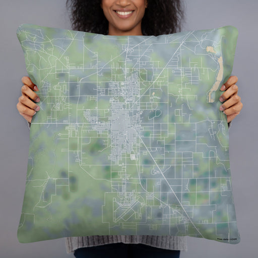 Person holding 22x22 Custom Roswell New Mexico Map Throw Pillow in Afternoon