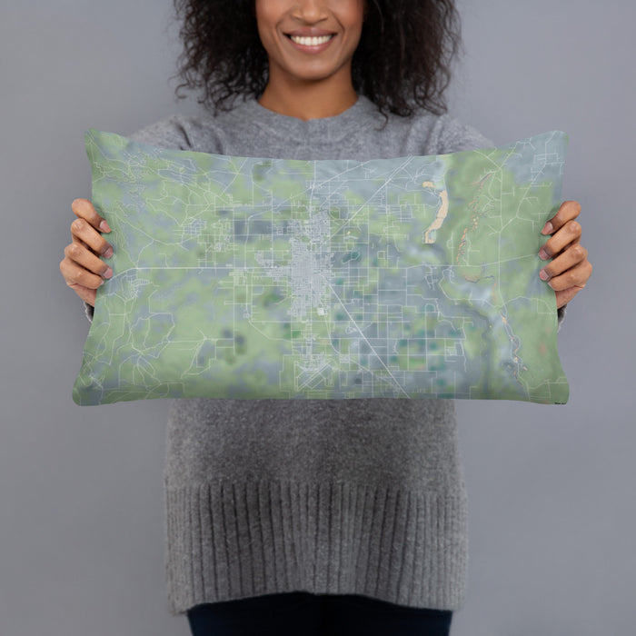 Person holding 20x12 Custom Roswell New Mexico Map Throw Pillow in Afternoon